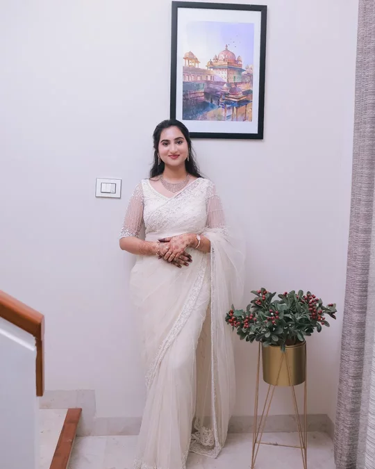 Christian bride in white saree portrait, Valliyur wedding photographer