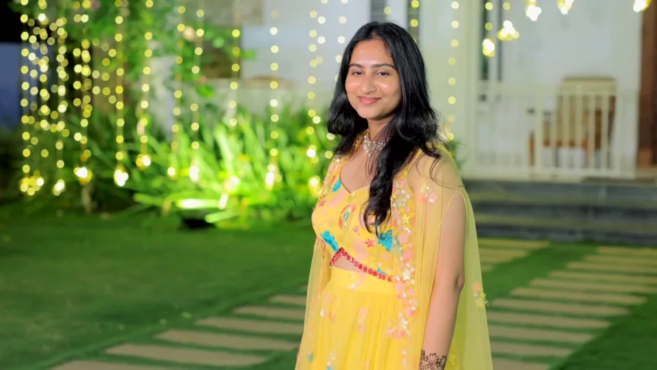 Sangeet portrait in yellow saree with fairy lights